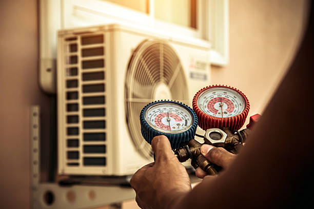 Professional Ductwork Repair technician working in Pine Brook, NJ